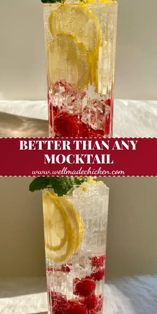 A tall ribbed glass featuring a refreshing drink recipe with sparkling water, red raspberries at the bottom, and lemon wheels pressed against the sides.